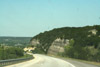 This roadcut shows the limestone underlying the hills.